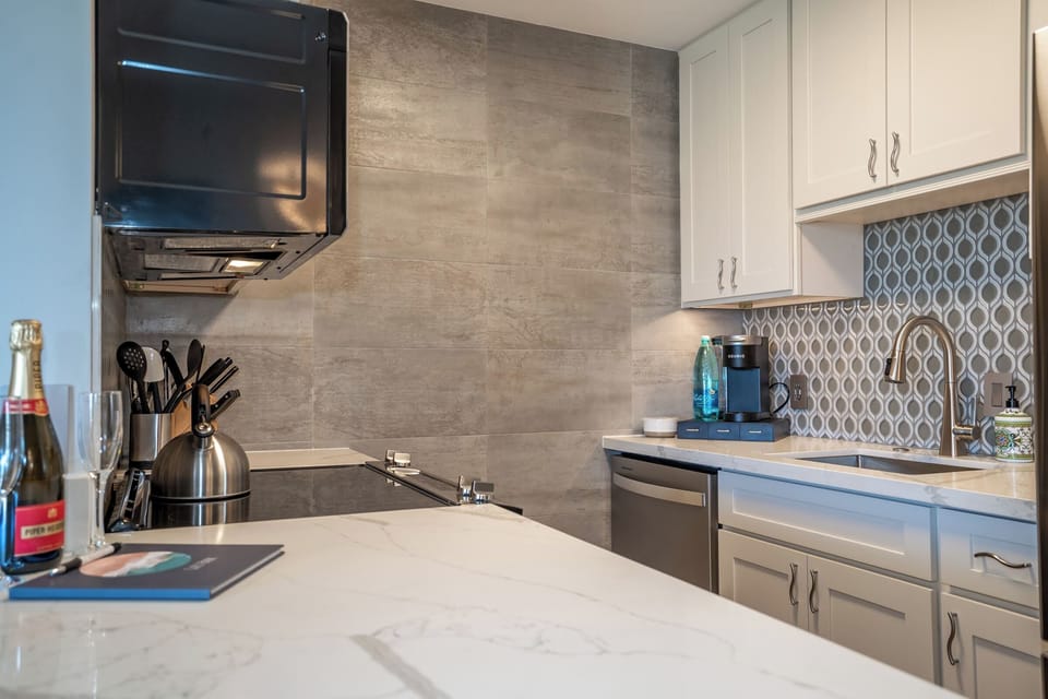 Luxury Condo | Private kitchen | Full-size fridge, microwave, oven, stovetop