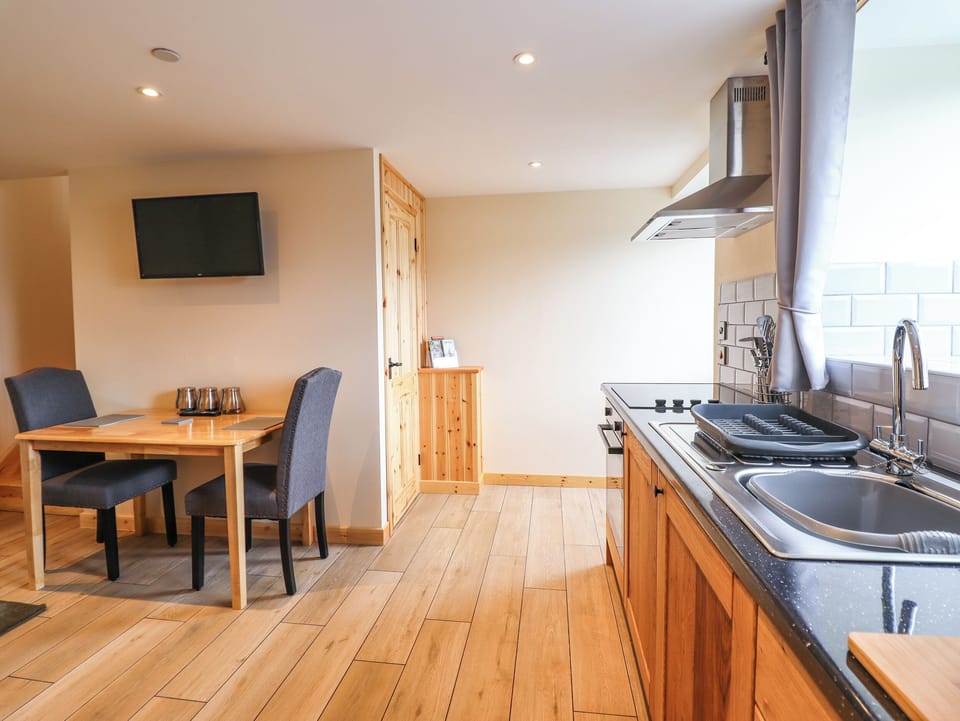 Fridge, electric kettle, toaster, cookware/dishes/utensils