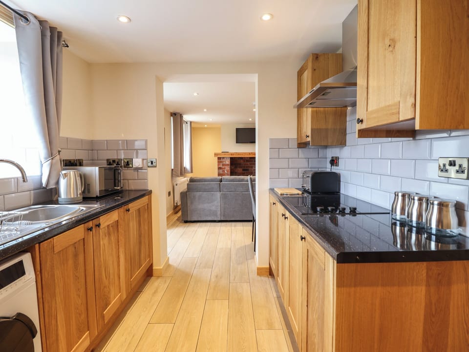 Fridge, electric kettle, toaster, cookware/dishes/utensils