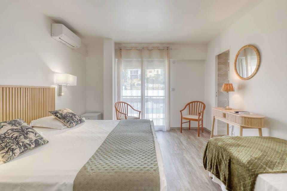 Superior Room, City View | Minibar, in-room safe, desk, laptop workspace