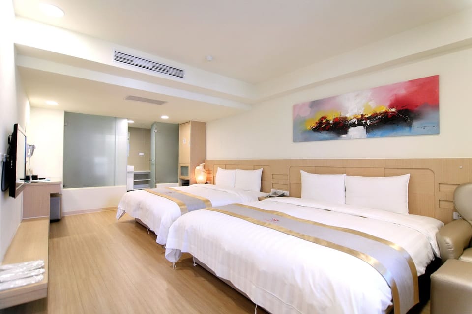 Quadruple Room | Premium bedding, down comforters, pillowtop beds, in-room safe