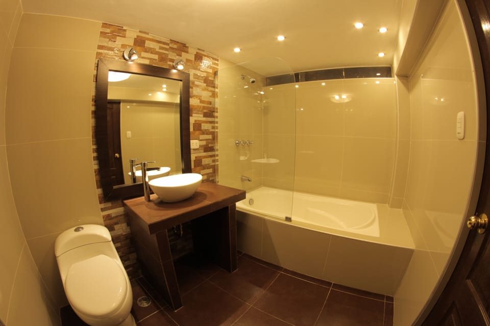 Superior Room | Bathroom | Rainfall showerhead, hair dryer, towels, soap