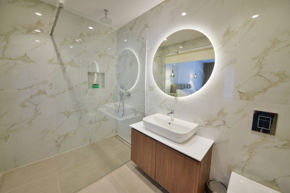 Shower, free toiletries, hair dryer, bathrobes