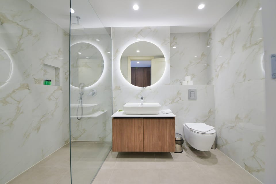 Shower, free toiletries, hair dryer, bathrobes