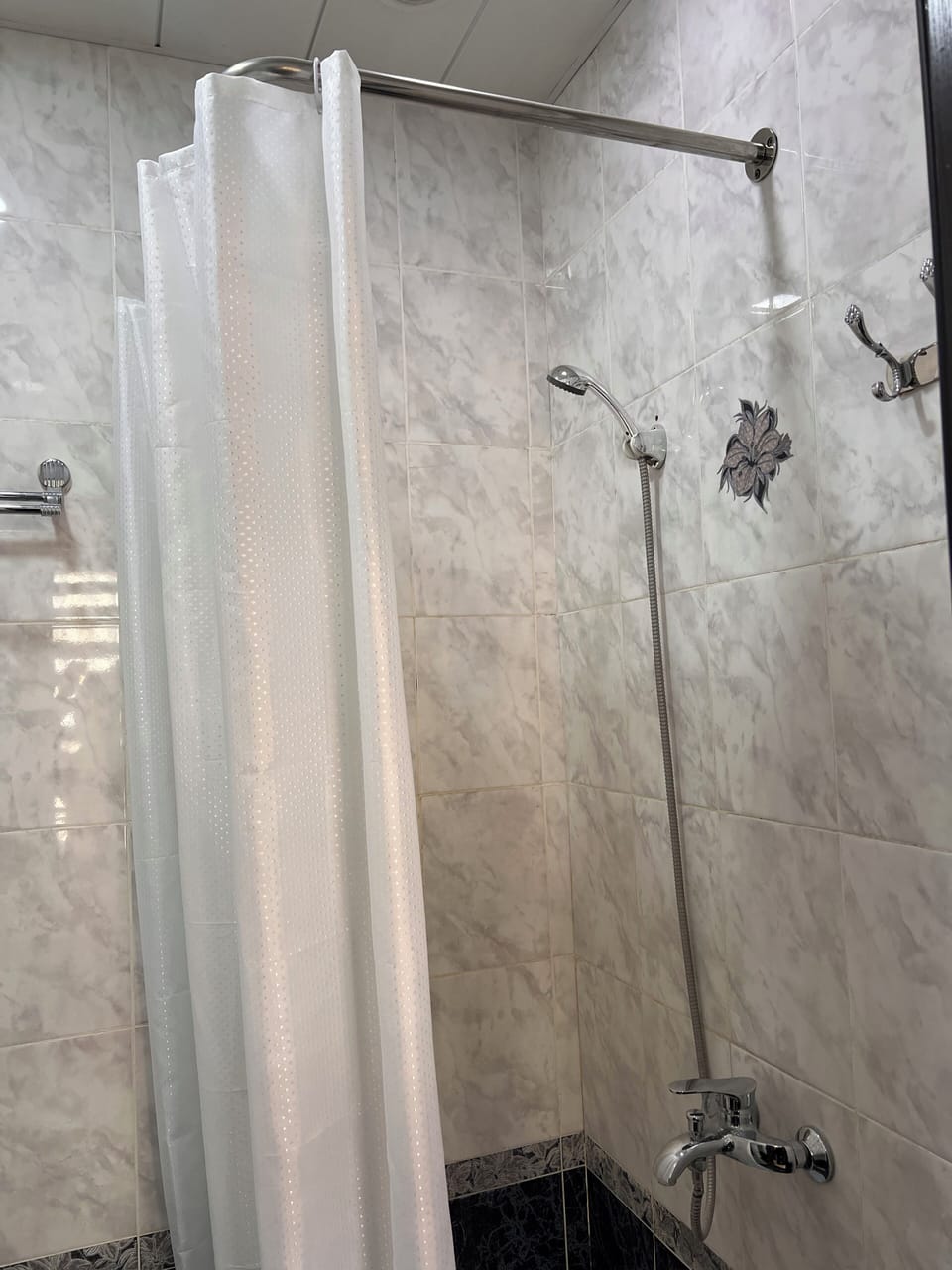 Rainfall showerhead, hair dryer (on request), towels, soap
