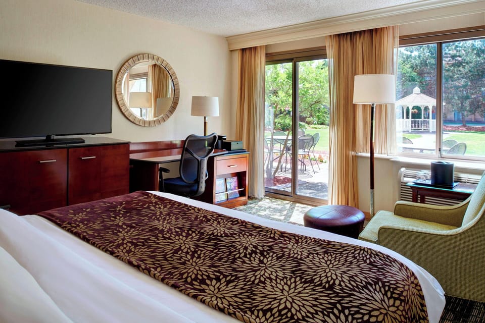 Premium bedding, down comforters, desk, iron/ironing board