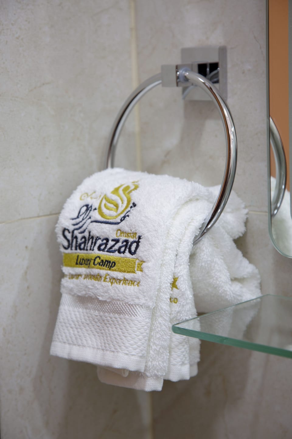 Rainfall showerhead, towels, soap, shampoo