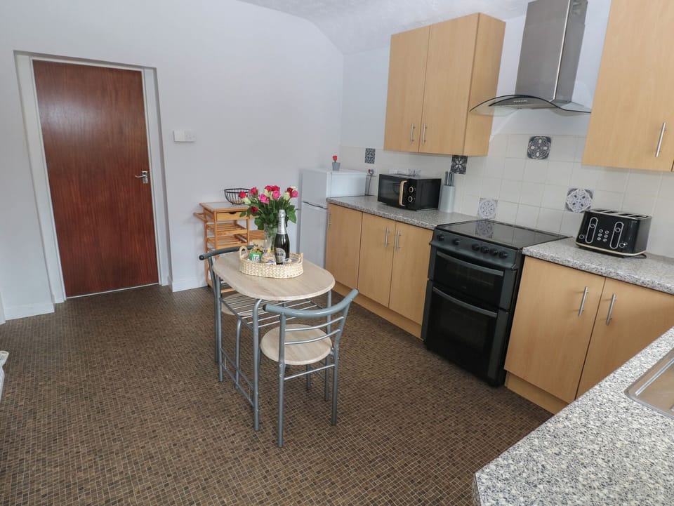 Fridge, dishwasher, electric kettle, toaster