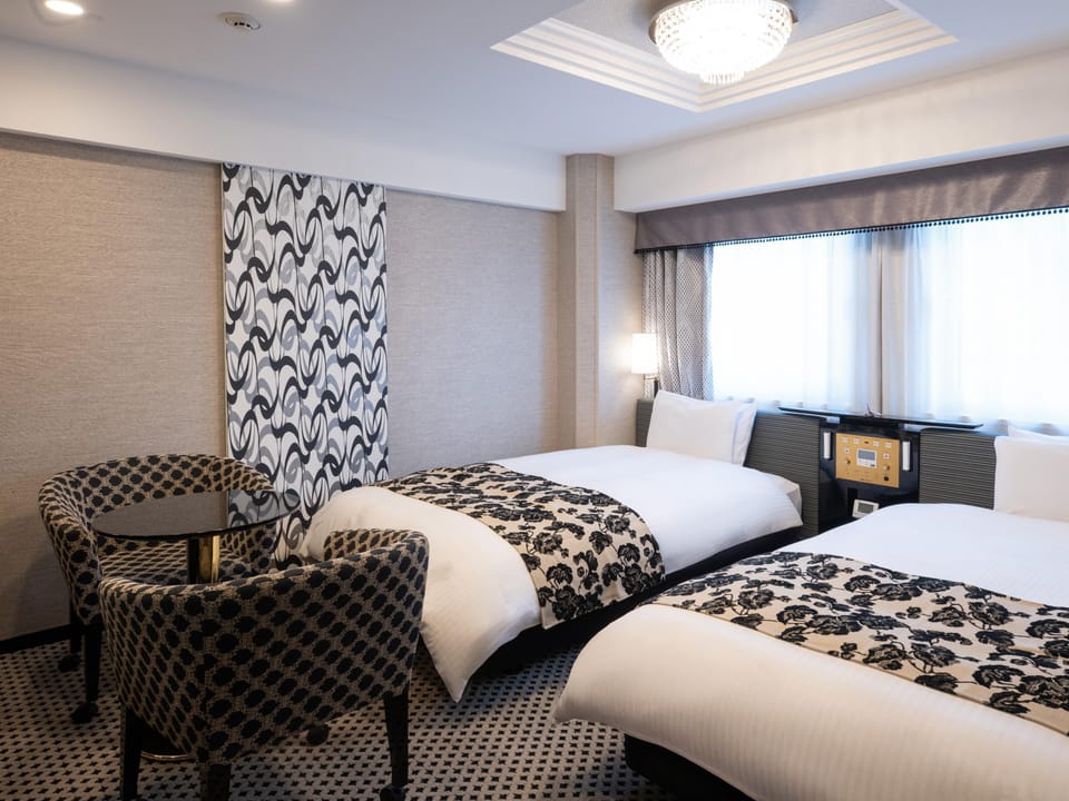Deluxe Twin Room, Non Smoking | Desk, laptop workspace, blackout drapes, soundproofing
