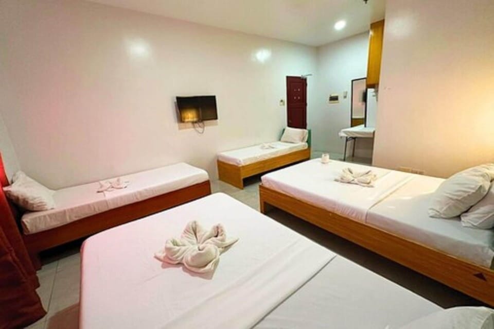 Family Room | Desk, bed sheets