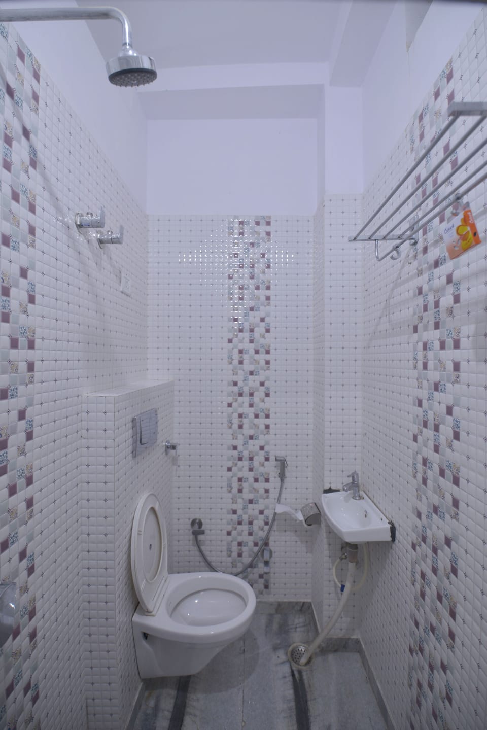 Shower, rainfall showerhead, hair dryer (on request), towels