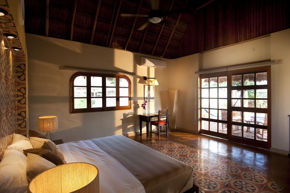 Deluxe Cabin, 1 King Bed, Private Pool, Garden View (Palapa Roof) | Minibar, in-room safe, desk, soundproofing
