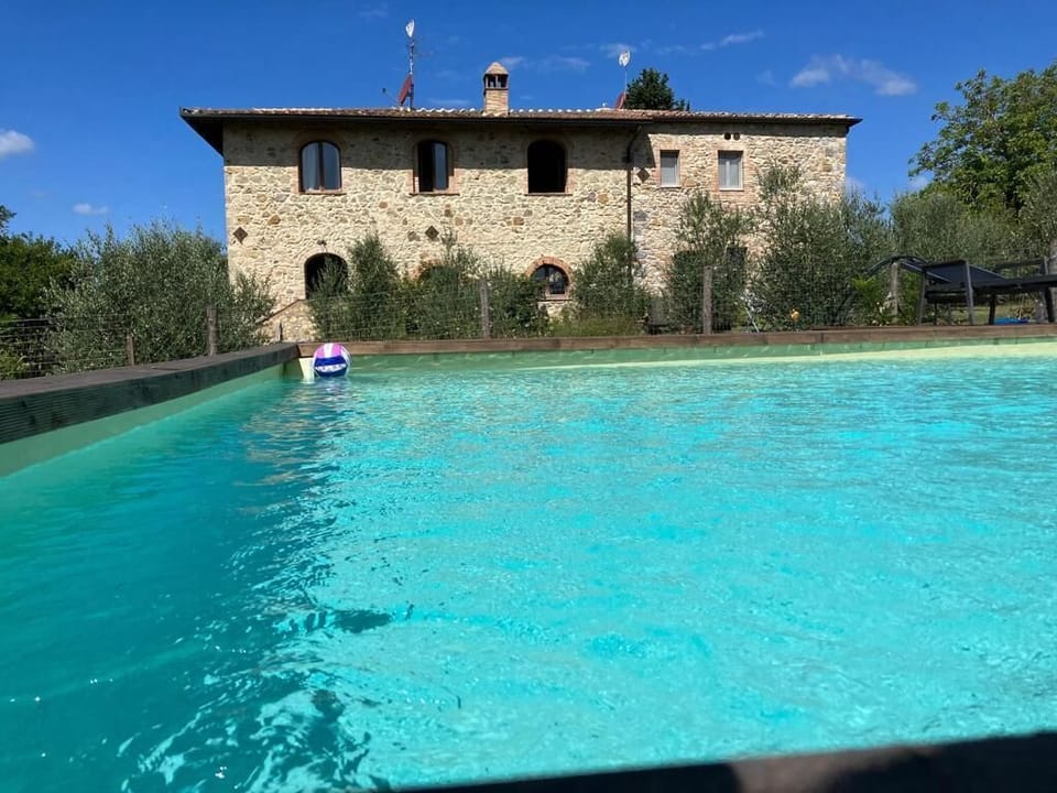 Seasonal outdoor pool, pool umbrellas