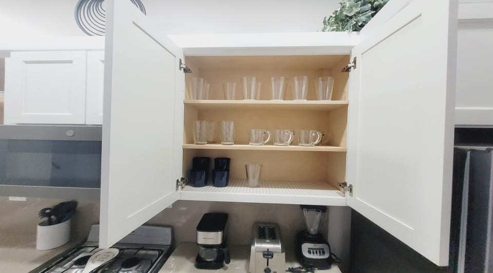 City Condo | Private kitchen | Full-size fridge, microwave, toaster, blender