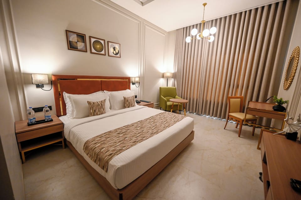 Club Room | Minibar, desk, laptop workspace, iron/ironing board
