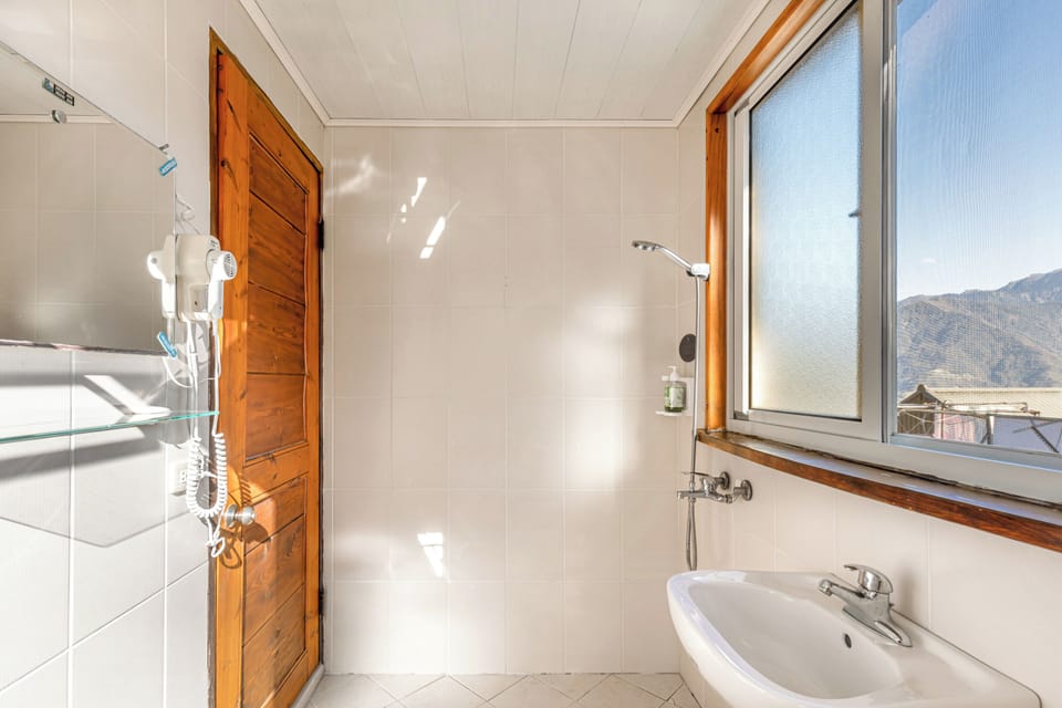 Family Room, Terrace | Bathroom | Shower, rainfall showerhead, hair dryer, slippers