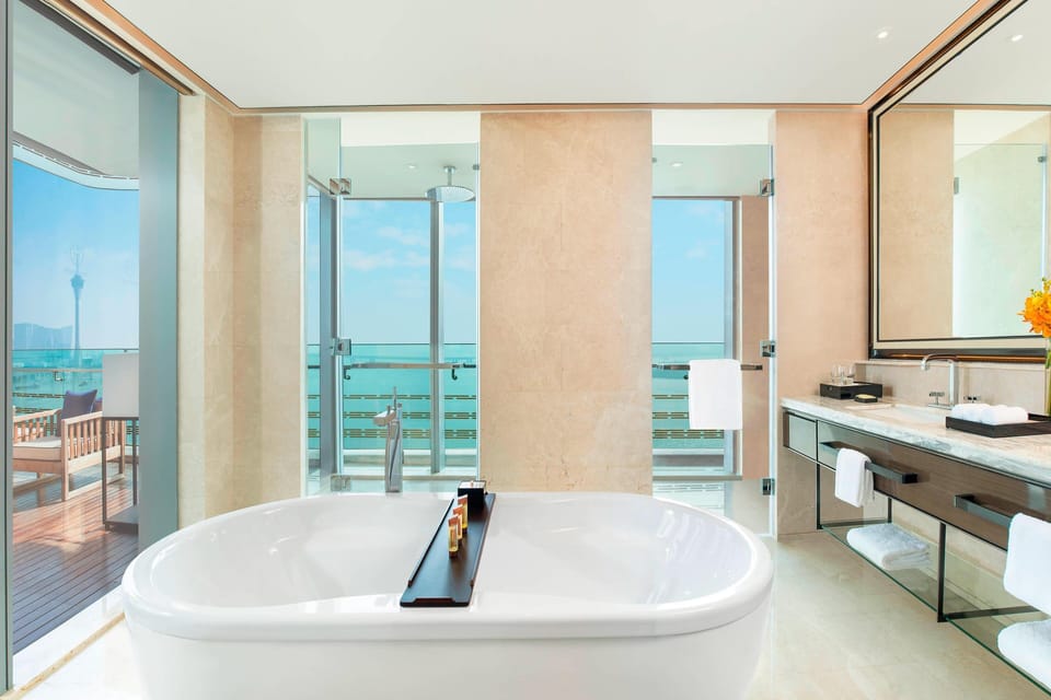 Club Suite, 1 Bedroom, Ocean View | Bathroom | Combined shower/tub, free toiletries, hair dryer, bathrobes