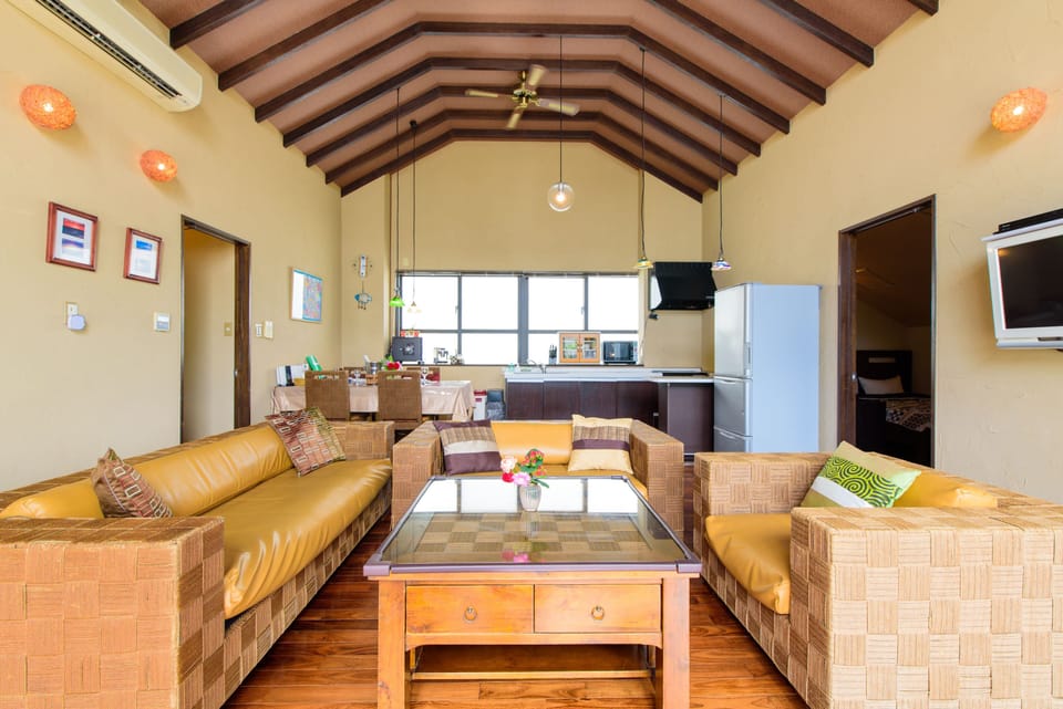 Deluxe Suite, 3 Bedrooms, Non Smoking (3rd Floor, For 1 - 6 People) | Living room | Flat-screen TV