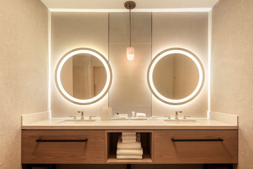 Shower, rainfall showerhead, hair dryer, towels