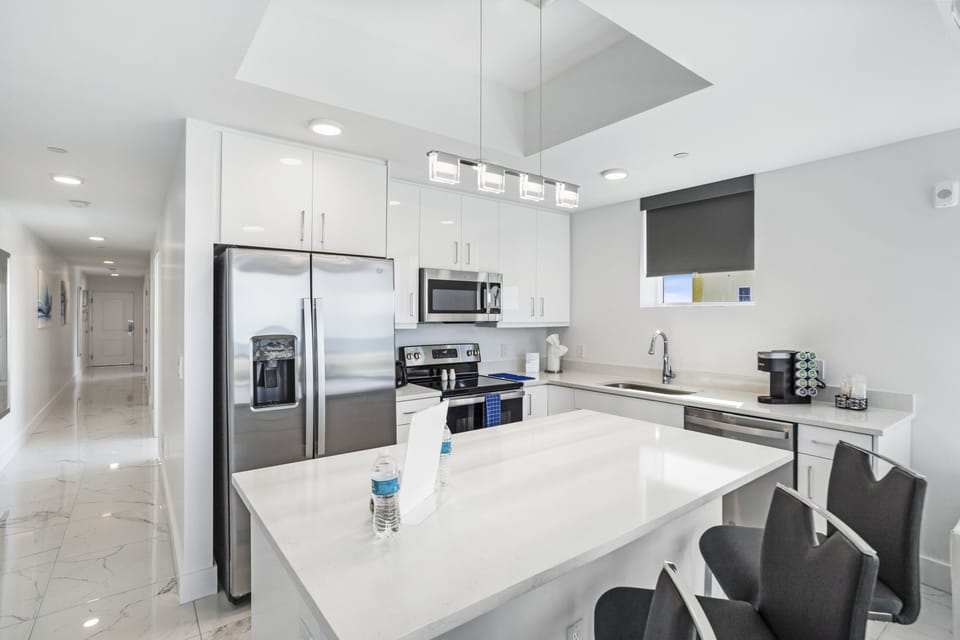 Junior Suite, 2 Bedrooms, Ocean View | Private kitchen | Full-size fridge, microwave, oven, stovetop