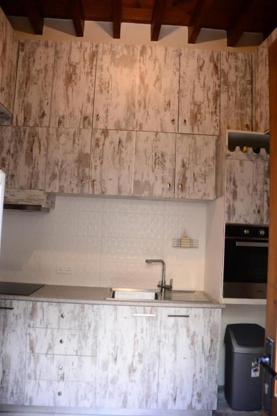 Coffee/tea maker, mini-fridge, electric kettle, paper towels