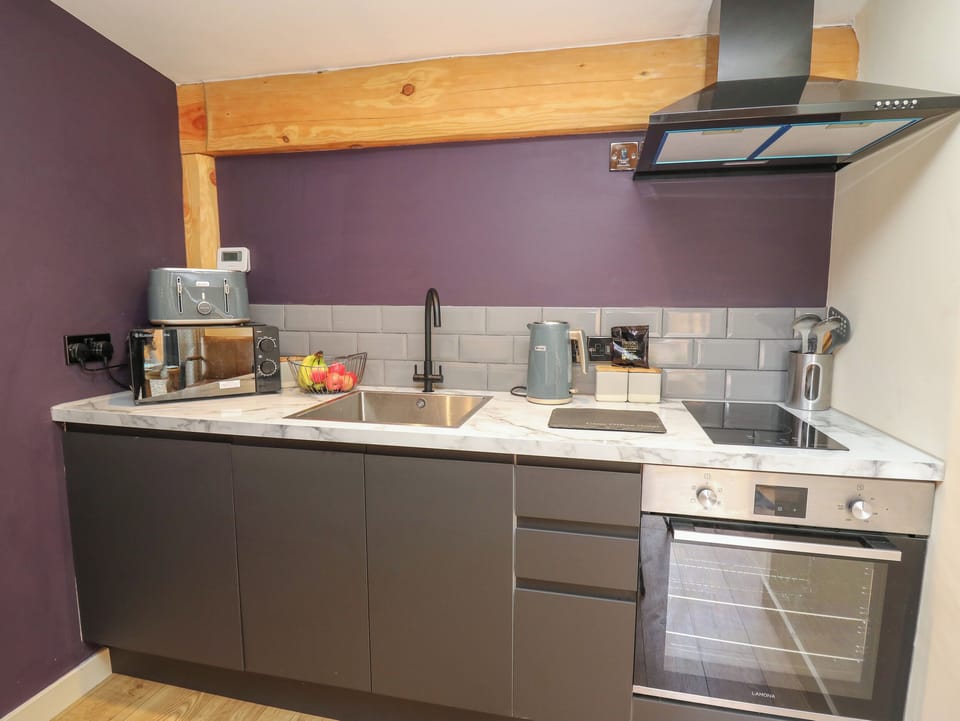 Fridge, electric kettle, toaster, cookware/dishes/utensils