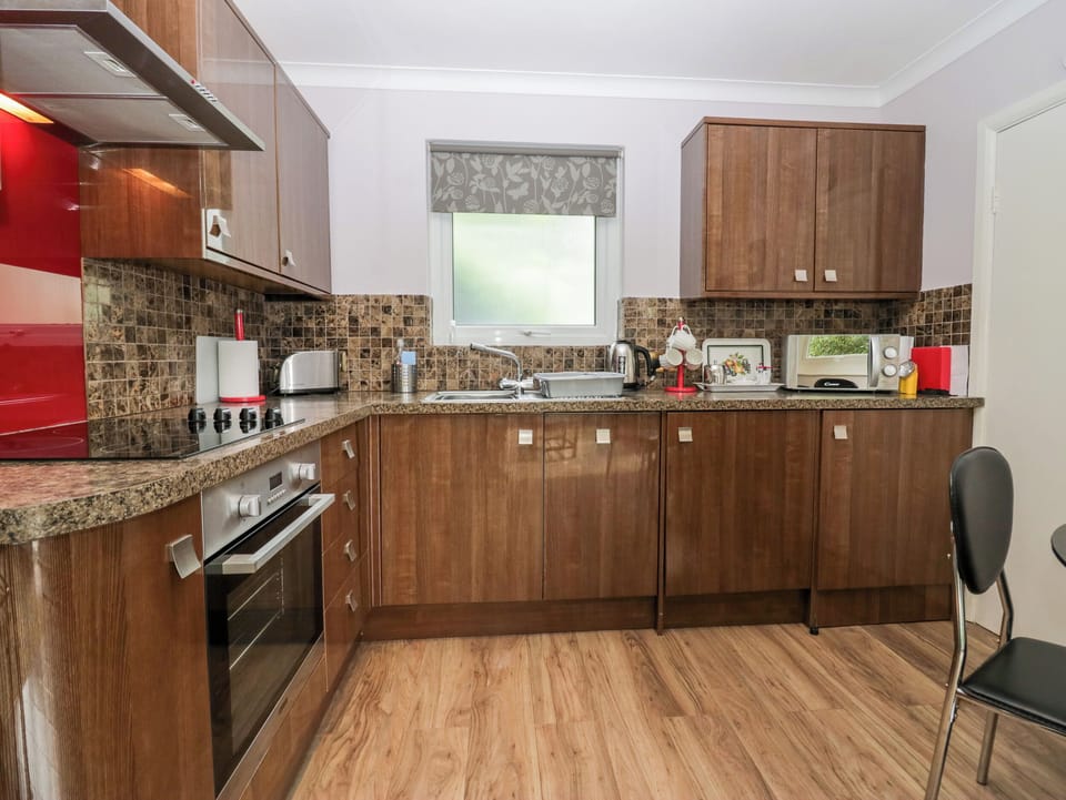 Fridge, electric kettle, toaster, cookware/dishes/utensils