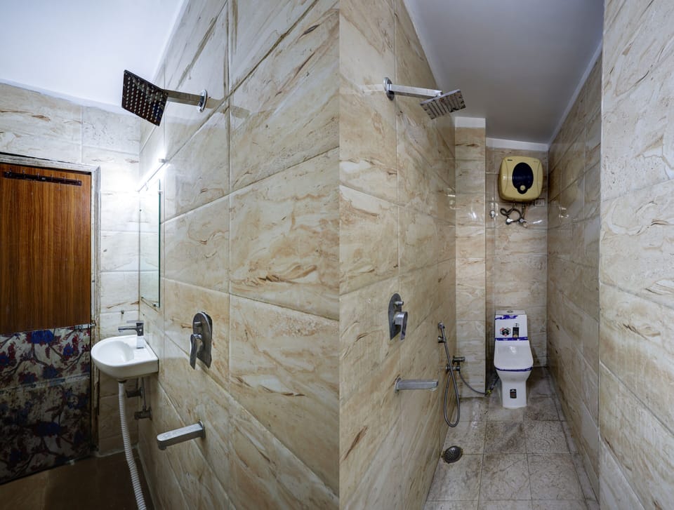 Shower, rainfall showerhead, towels, soap