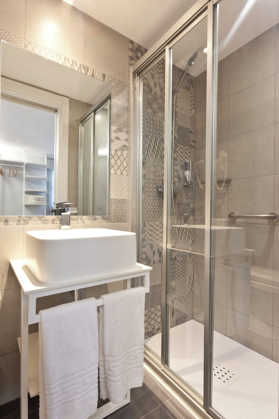 Shower, hair dryer (on request), towels, shampoo