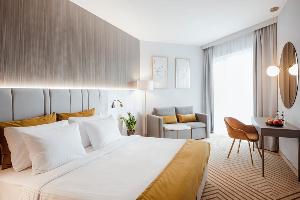 Classic Double Room, Balcony | In-room safe, desk, laptop workspace, blackout drapes