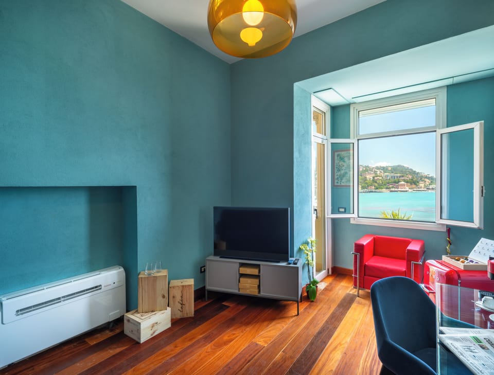 Junior Suite | Living area | 30-inch Smart TV with satellite channels