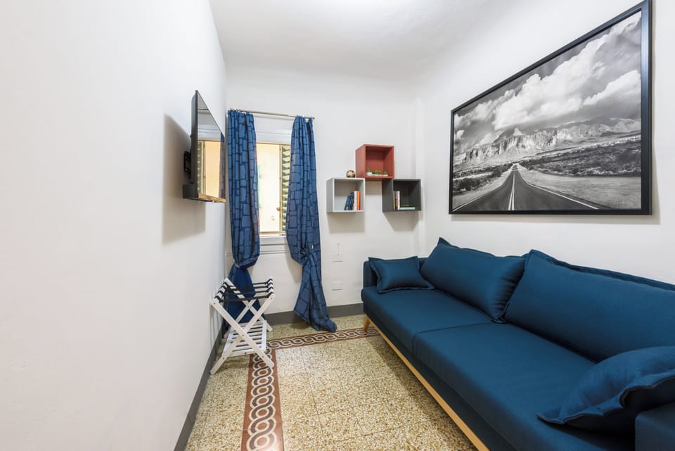 Comfort Apartment | Living area | Flat-screen TV