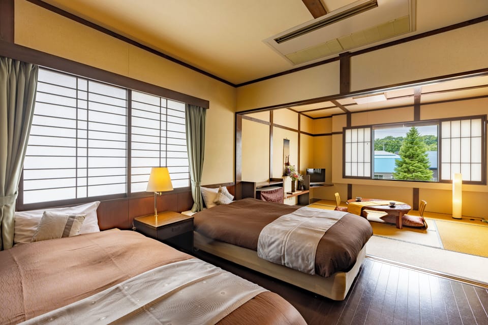 Deluxe Twin Room Kagaribi [City side] | Desk, free WiFi, bed sheets