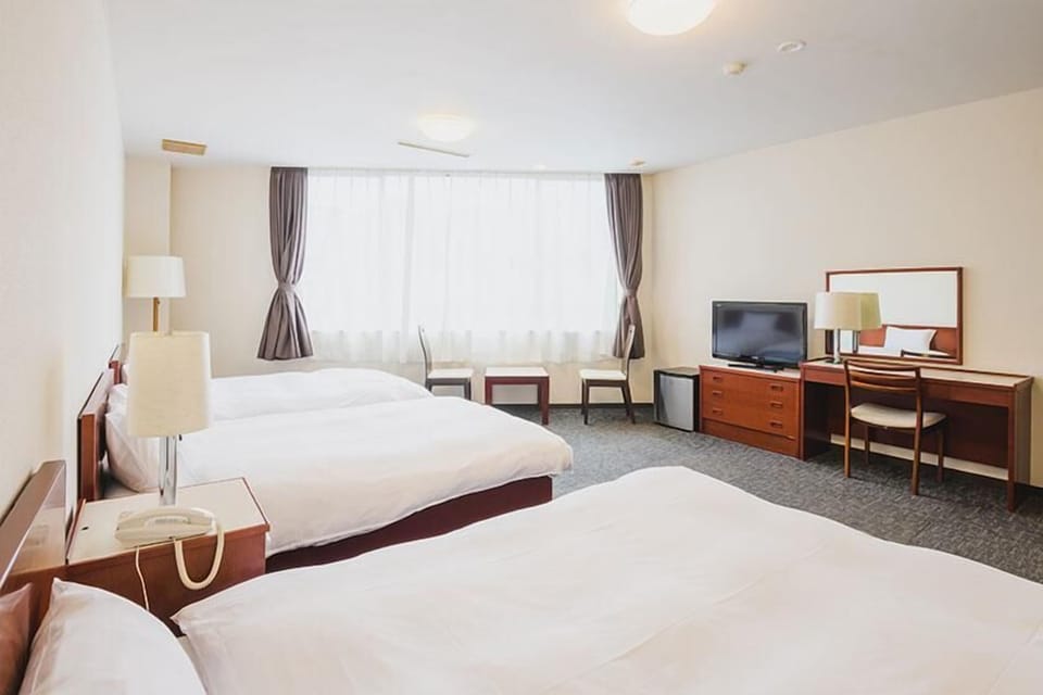Economy Triple Room(Annex) - Indoor Bath - Non-Smoking | Bed sheets
