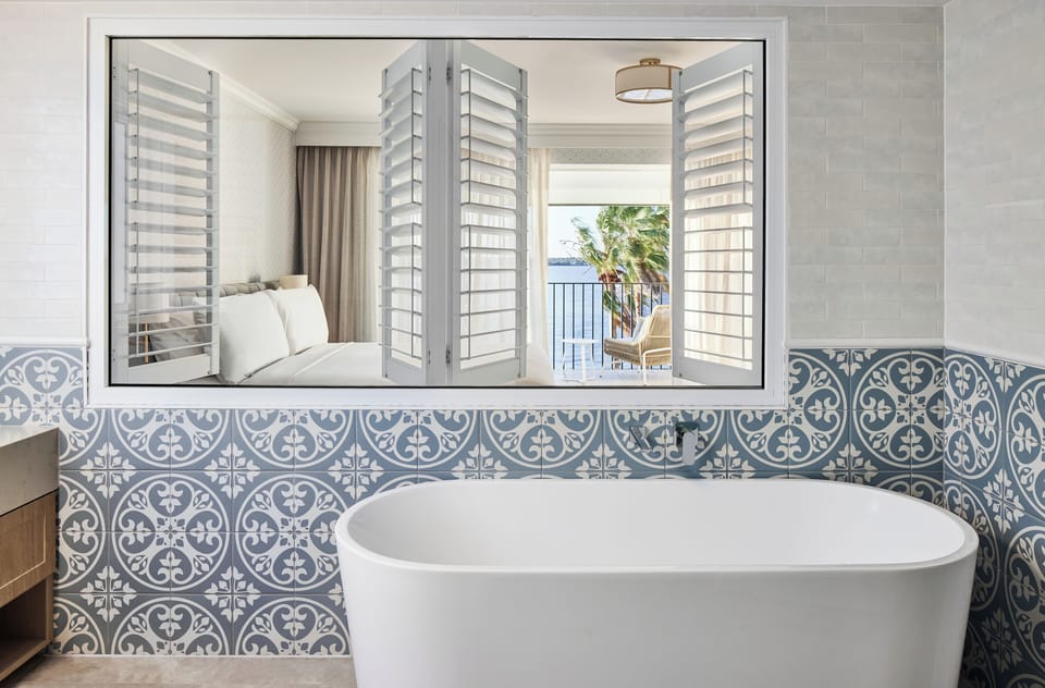Beachcomber Water View Deluxe - King | Bathroom | Shower, hydromassage showerhead, free toiletries, hair dryer