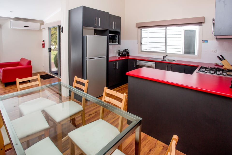 2 Bedroom Cabin - Albatross | Living area | Flat-screen TV, DVD player