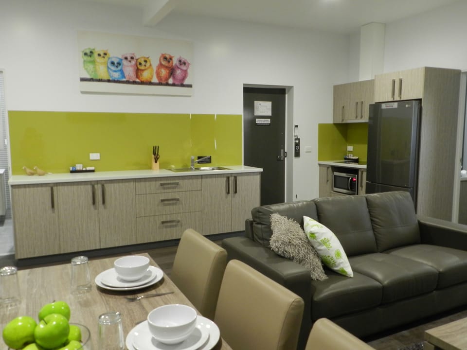 Deluxe Apartment, 4 Bedrooms | Living area | 42-inch LCD TV with digital channels, TV