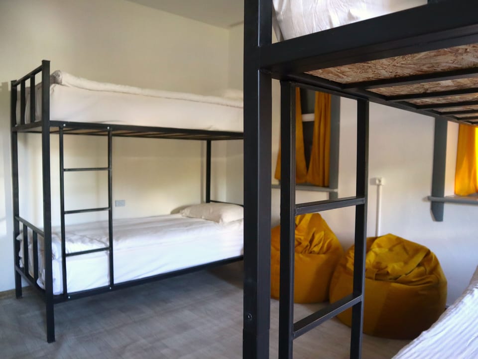 Laptop workspace, free WiFi, bed sheets