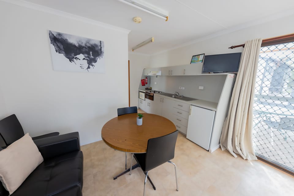Budget Cabin | Private kitchen | Fridge, stovetop, cookware/dishes/utensils