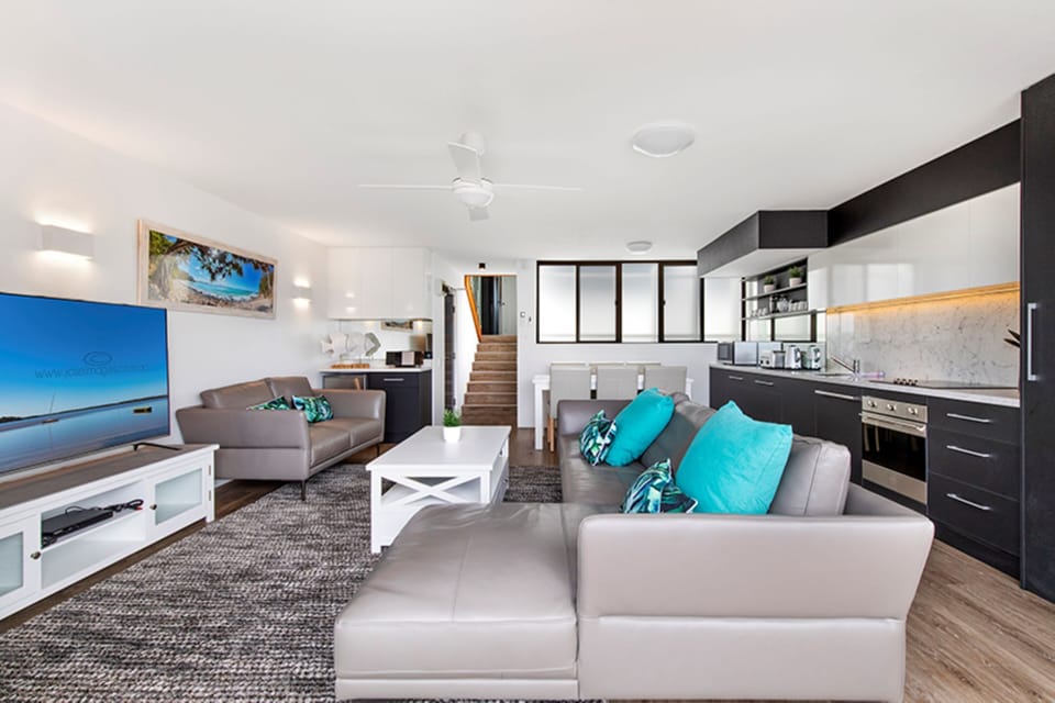 Palm View Deluxe Apartment 3 Bedroom | Living area | 30-inch Smart TV with digital channels, Netflix, DVD player