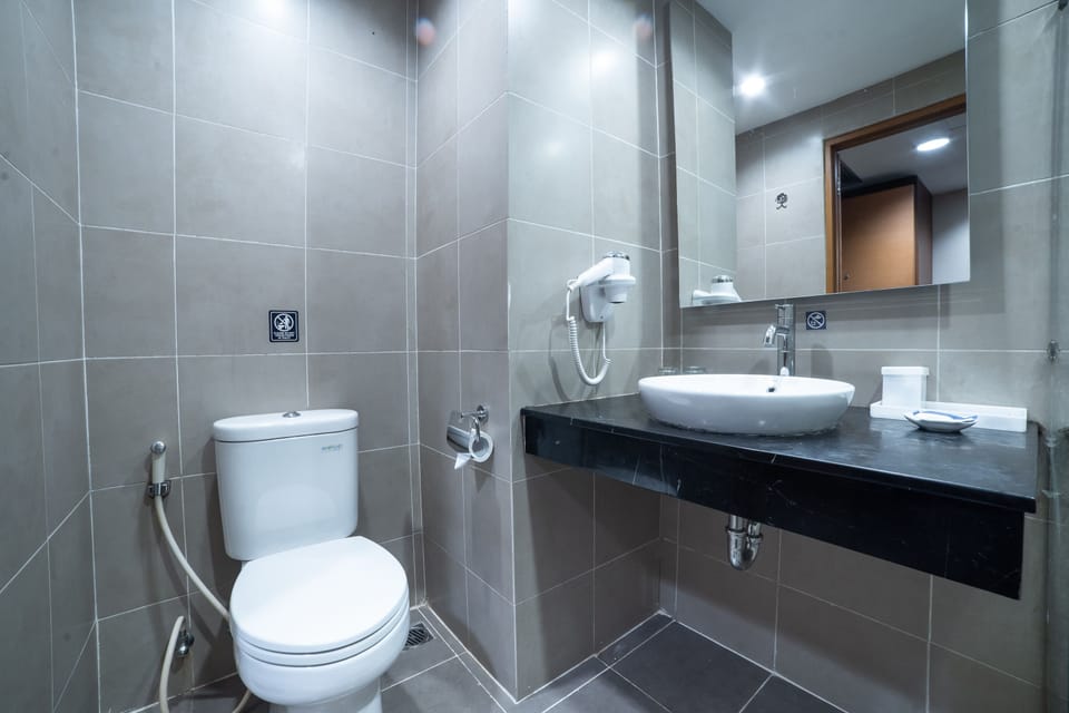 Shower, free toiletries, slippers, towels