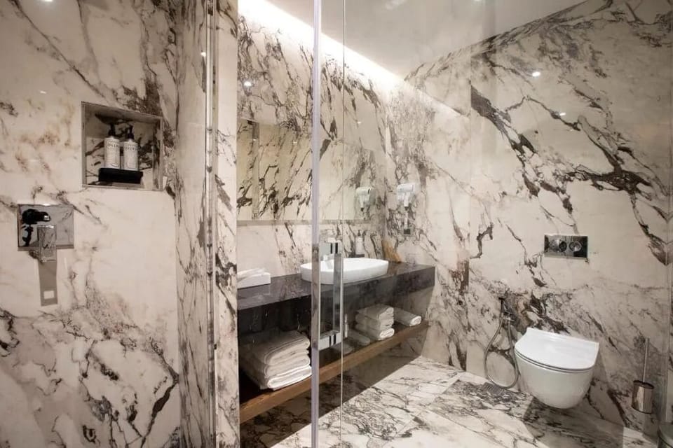 Shower, free toiletries, hair dryer, slippers