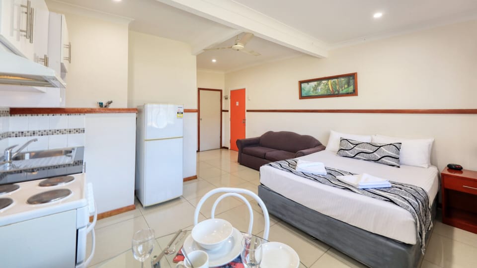 Executive One Bedroom Apartment | Premium bedding, desk, laptop workspace, iron/ironing board