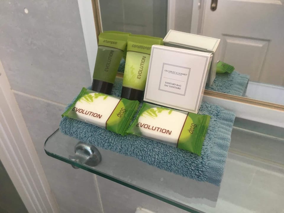 Superior Room, Multiple Beds | Bathroom | Shower, hair dryer, towels, soap