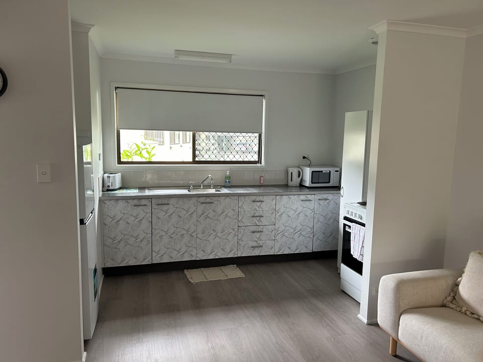 Villa | Private kitchen | Coffee/tea maker, full-size fridge, microwave, stovetop