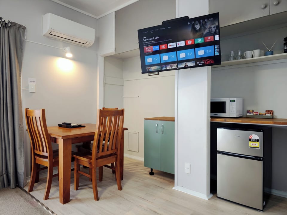 Classic Suite | Living area | 43-inch Smart TV with cable channels