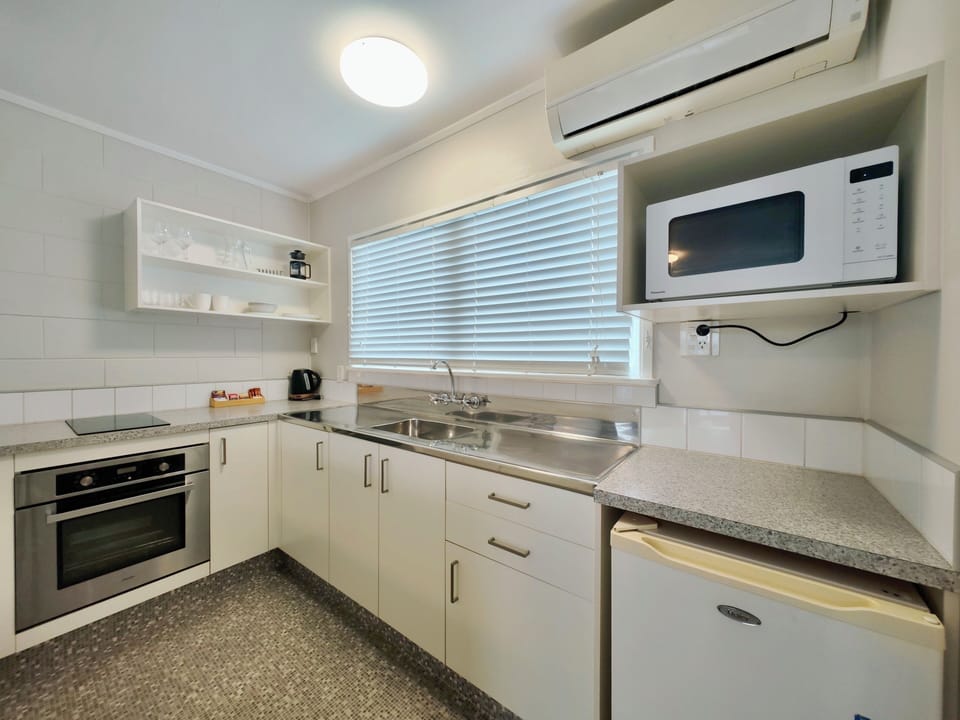 One Bedroom Unit | Private kitchen | Fridge, microwave, electric kettle, toaster