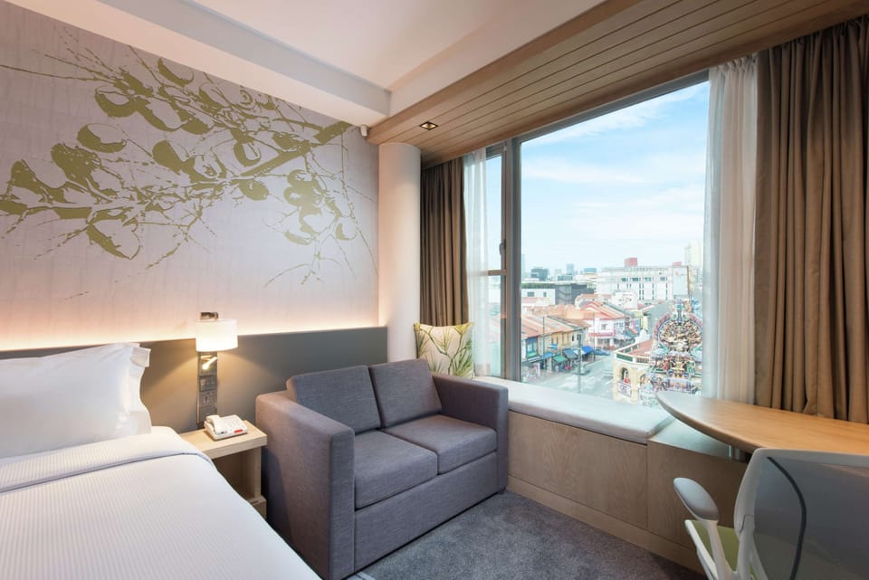 Deluxe Room, 1 King Bed with Sofa bed | In-room safe, desk, laptop workspace, blackout drapes