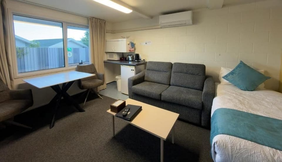 One Bedroom Studio | Living area | Flat-screen TV