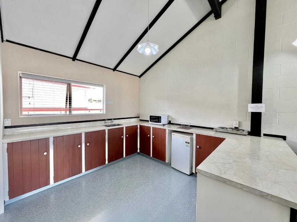 Two-bedroom Apartment With Balcony | Private kitchen | Coffee/tea maker, electric kettle, dining tables